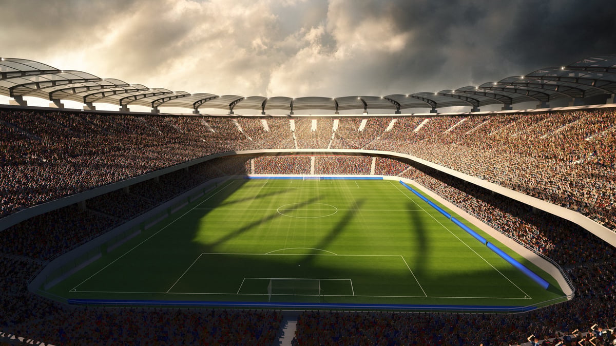 3D soccer stadium filled with fans under dramatic evening light